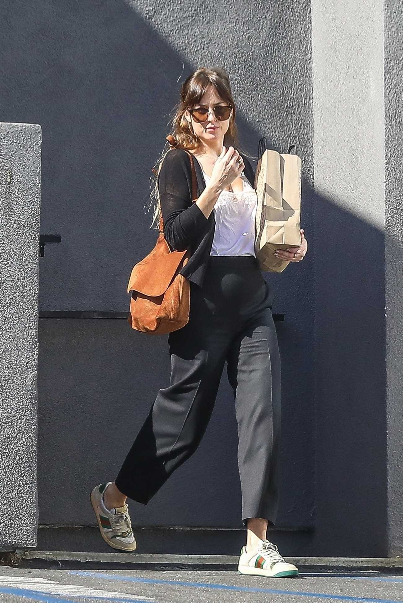 Dakota_Johnson_-_In_West_Hollywood2C_04242019-02.jpg