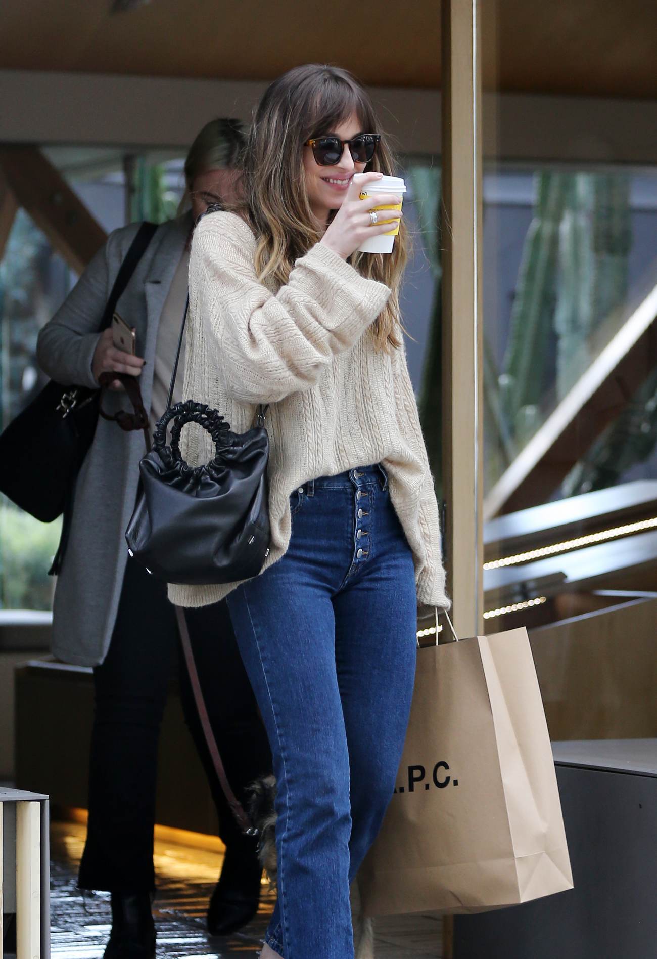 Dakota_Johnson_-_Shopping_at_A_P_C_with_her_dog_and_a_friend_on_Melrose_Place_in_Los_Angeles_-_March_100005.jpg