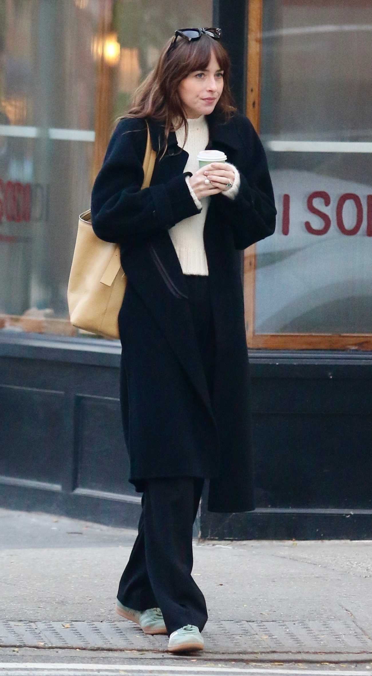Dakota_Johnson_-_Was_seen_taking_a_relaxed_stroll_with_a_friend_in_Manhattan_s_West_Village_-_November_162C_202302.jpg Dakota_Johnson_-_Was_seen_taking_a_relaxed_stroll_with_a_friend_in_Manhattan_s_West_Village_-_November_162C_202302.jpg