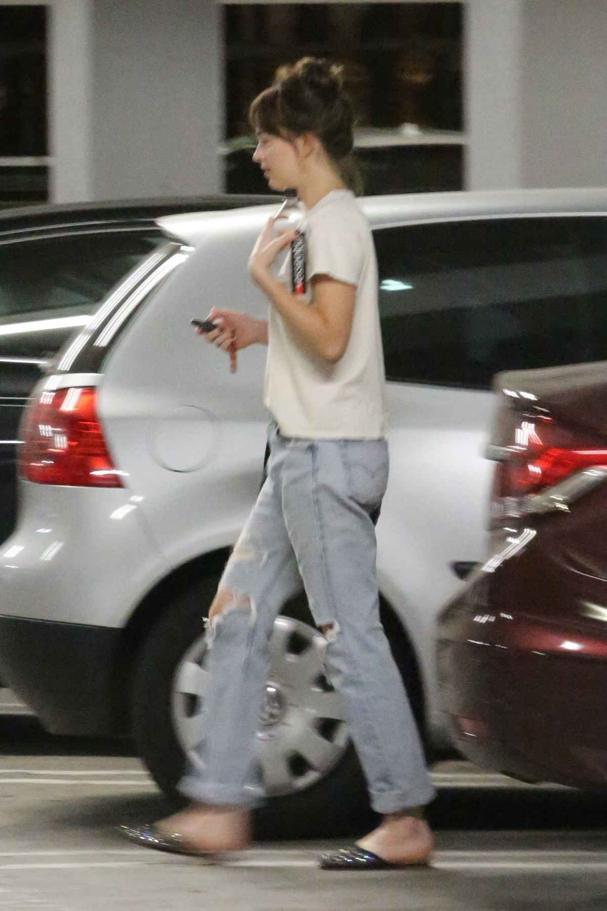 Dakota_Johnson_-_at_the_Arclight_Cinemas_with_her_friend_Addison_Timlin_in_Hollywood_-_July_600002.jpg