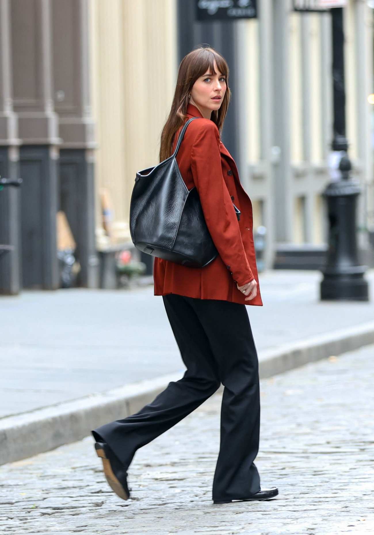Dakota_Johnson_-_seen_at_the_movie_set_of_the__Materialists__in_New_York_May_162C_2024_23.jpg